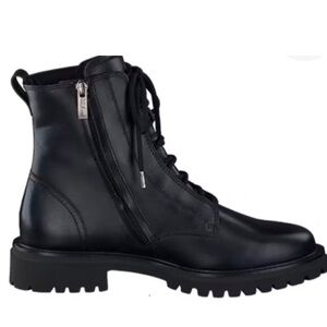 Combat boot. Waterproof 
Never used
Women’s US sizes. Black Leather